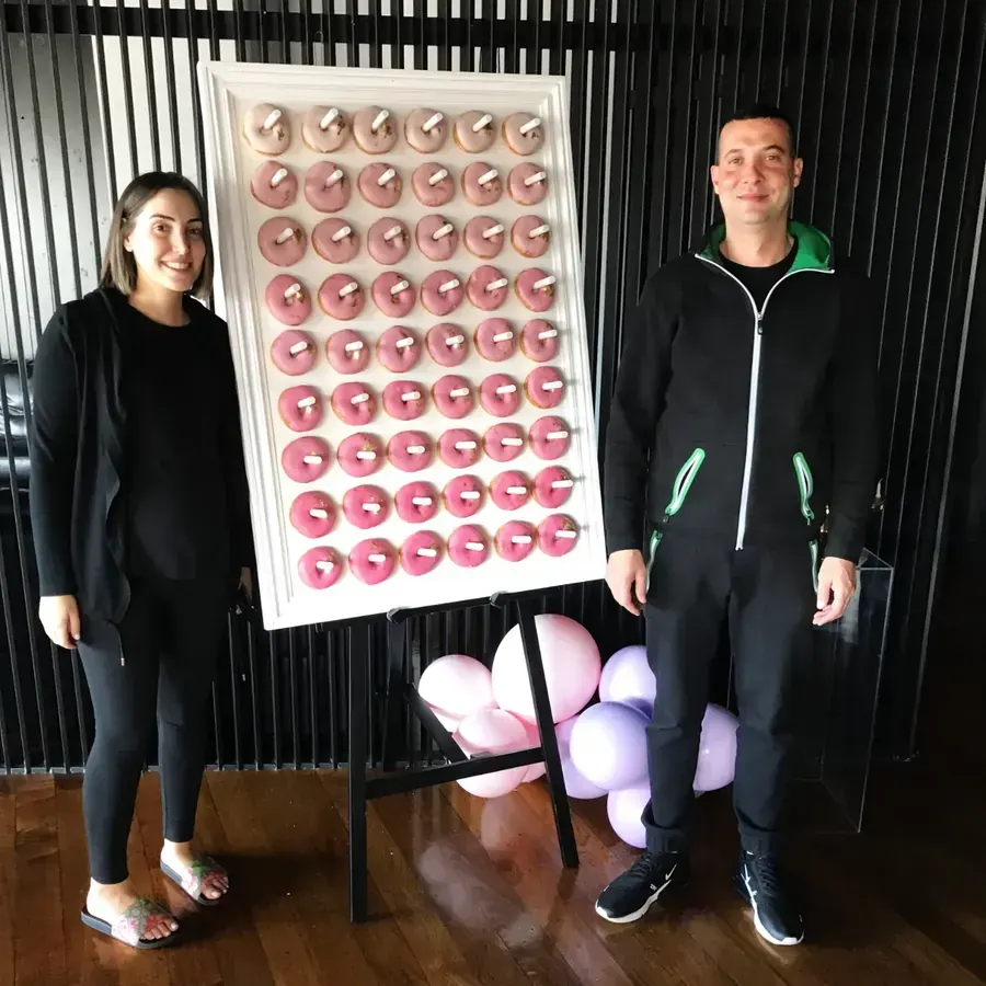 Donut wall hire Brisbane with fully stocked donut table display